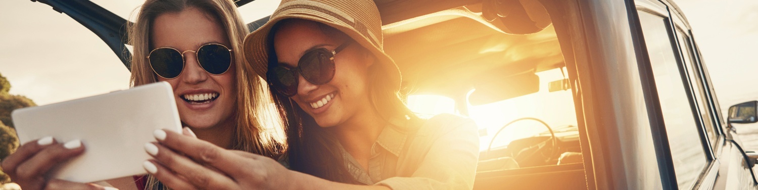Two women taking a selfie on vacation Two women taking a selfie on vacation