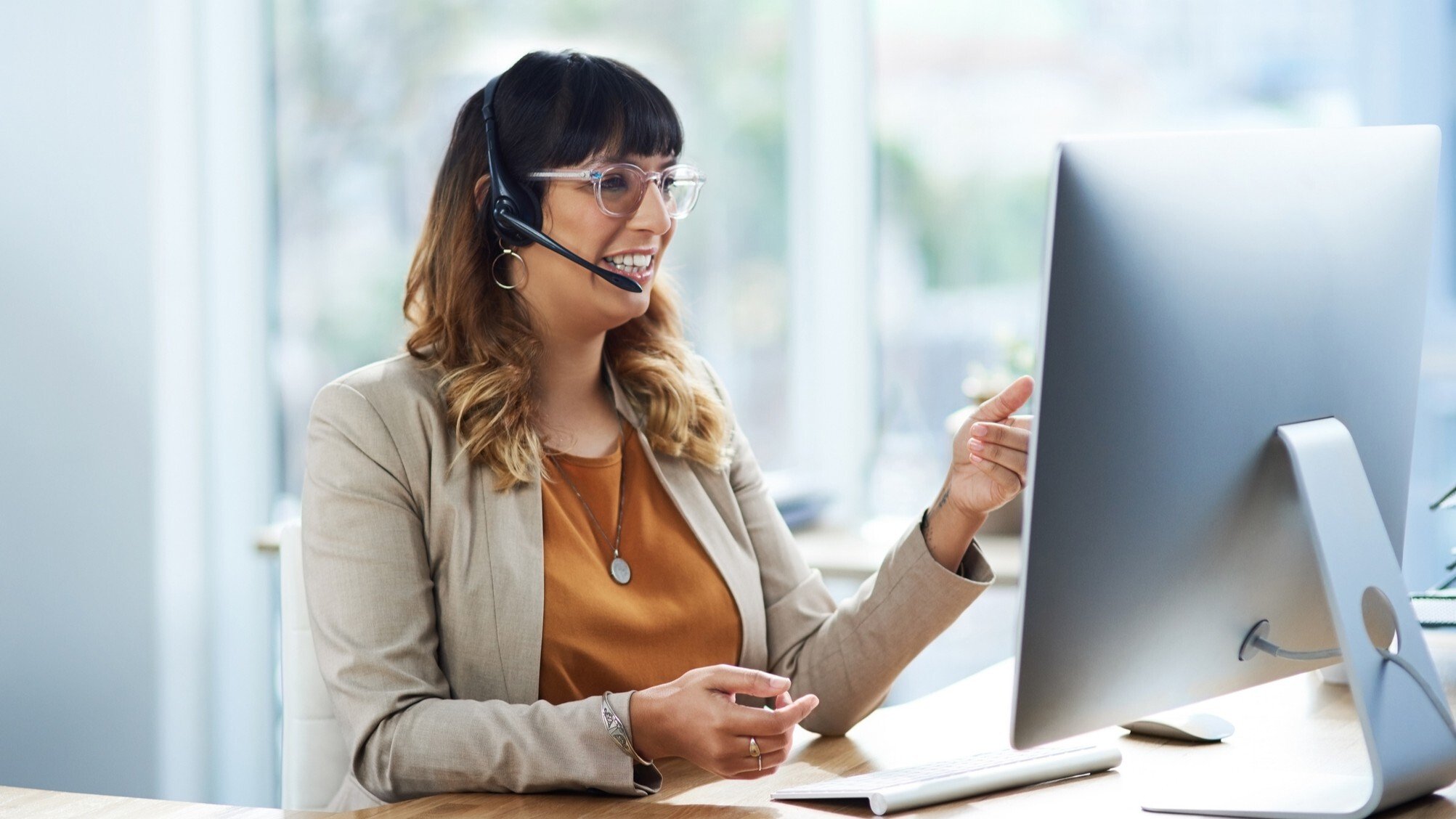 Happy Busy Woman Working at Computer