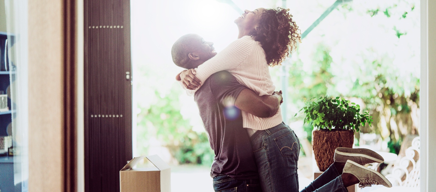 Image - couple hugging in new home