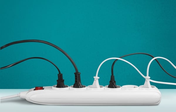 Powerstrip with chords plugged in-1