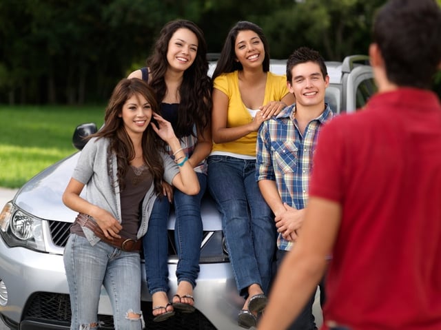 college seniors in SUV