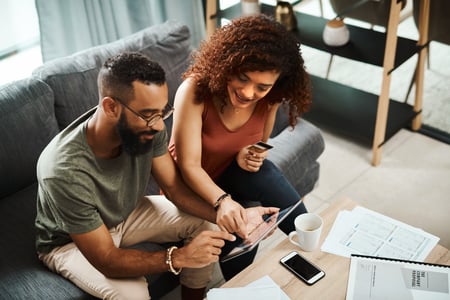 couple doing finances together in florida apartment