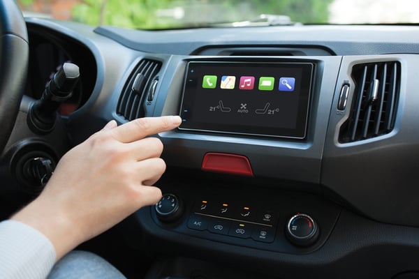 driver controlling bluetooth car display