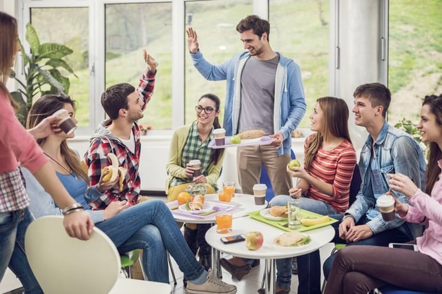 friends eating in college cafeteria