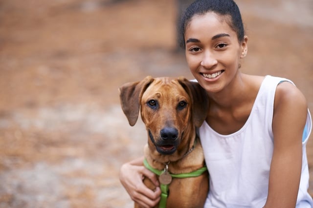 girl smiling with dog.jpg