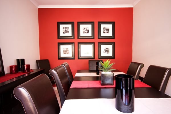 red accent wall in modern living room