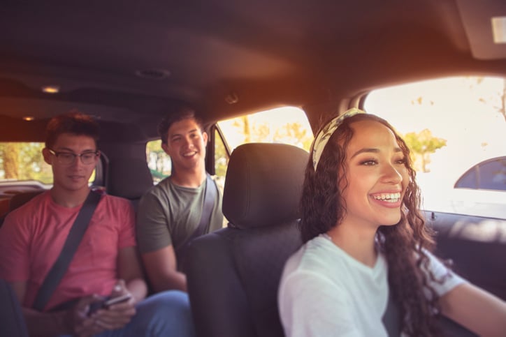 young urban rideshare driver taking a trip