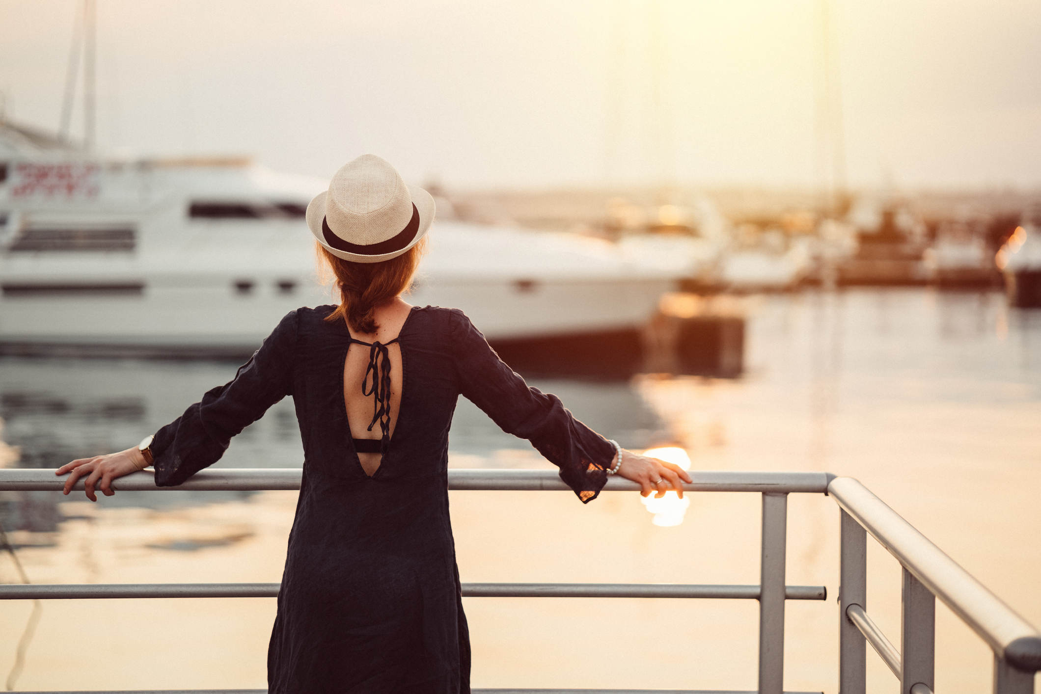 Woman looking at boats 