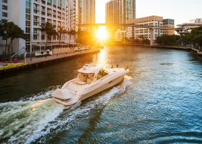 boaing in miami river during sunset